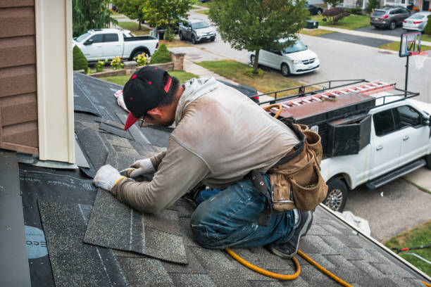 Professional Roofing technician working in Slocum, RI